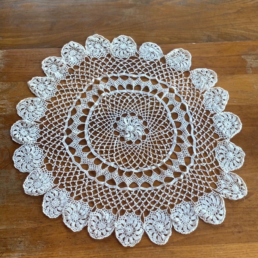 Vintage hand made cream color 22” crocheted fine gauge cotton string doilie